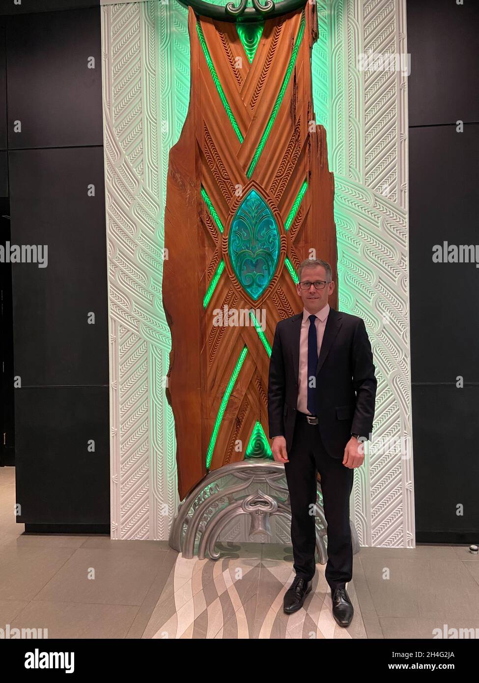 Assistant Governor Christian Hawkesby stands with an art installation of Maori forest god Tane Mahuta at the lobby of New Zealand's Central Bank building in Wellington, New Zealand September 22, 2021. Picture taken September 22, 2021. REUTERS/Praveen Menon Stock Photo