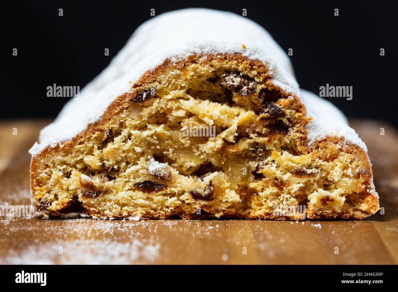 Marzipan Stollen cake with icing sugar, sliced Stock Photo