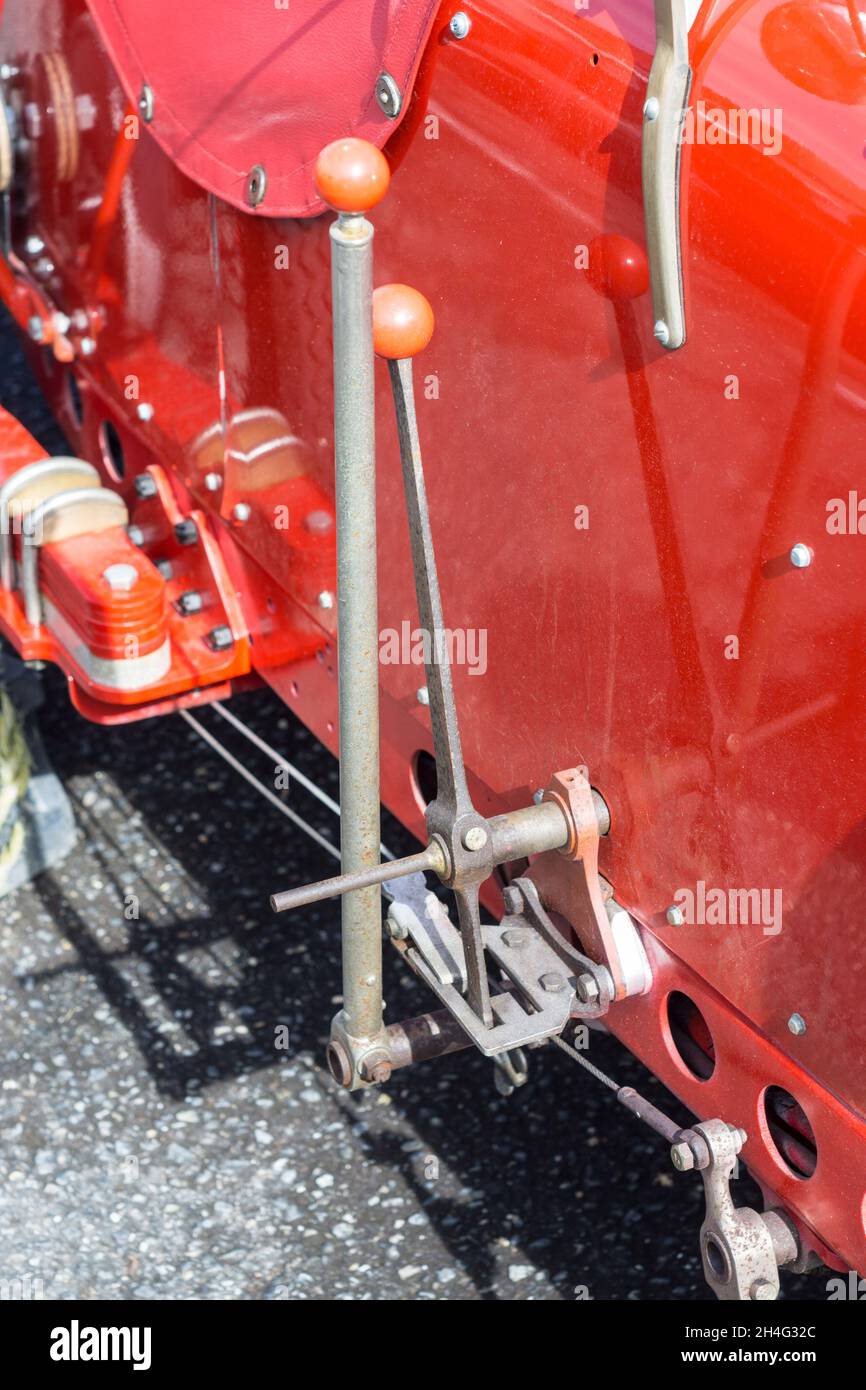 Close up detail of the brake and gearstick on a 1927 red Amilcar C6 Voiturette classic vintage sports racing car Stock Photo