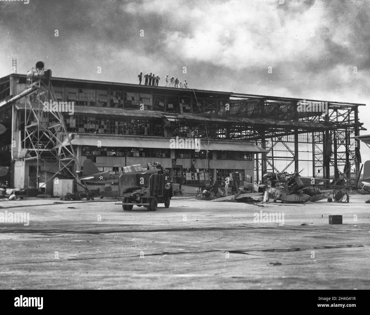 Photograph of Planes and Hangars Wrecked in the Japanese Attack on Pearl Harbor Stock Photo