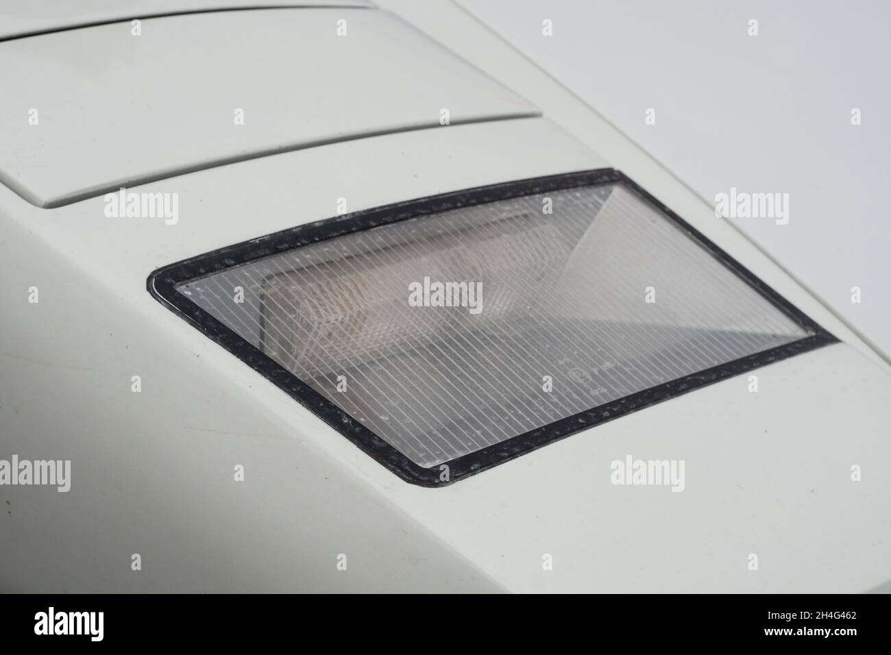 Close up detail of the front sidelight and indicator turn signal on a