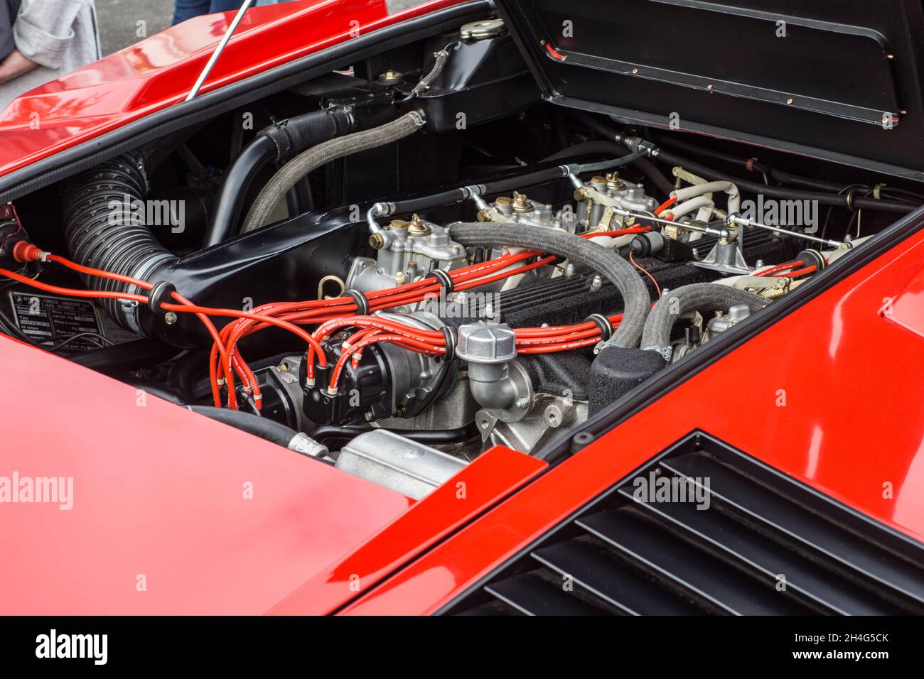 Close up detail of the V12 engine bay on a red Countach