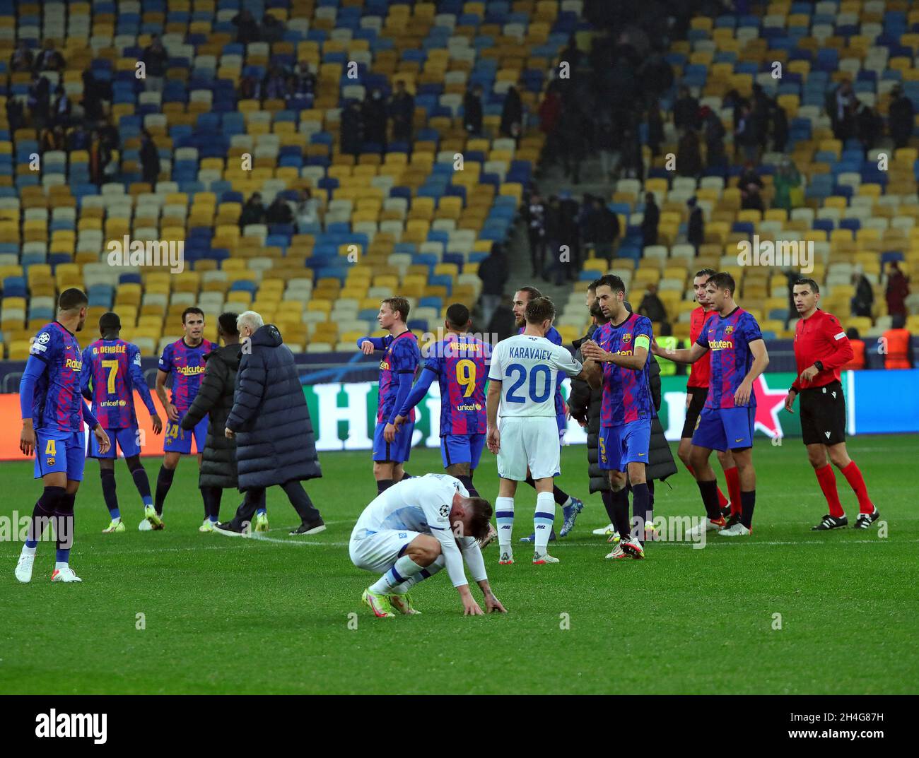 Kyiv, Ukraine. 02nd Nov, 2021. KYIV, UKRAINE - NOVEMBER 2, 2021 - Players  of FC Dynamo Kyiv (white kit) and FC Barcelona (blue kit) are seen after  the 2021/2022 UEFA Champions League