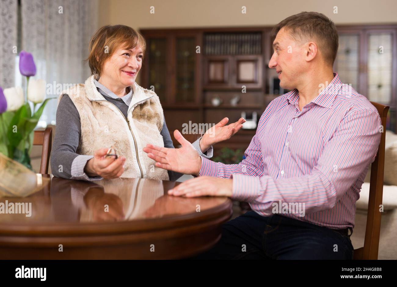 Woman having conversation with son Stock Photo