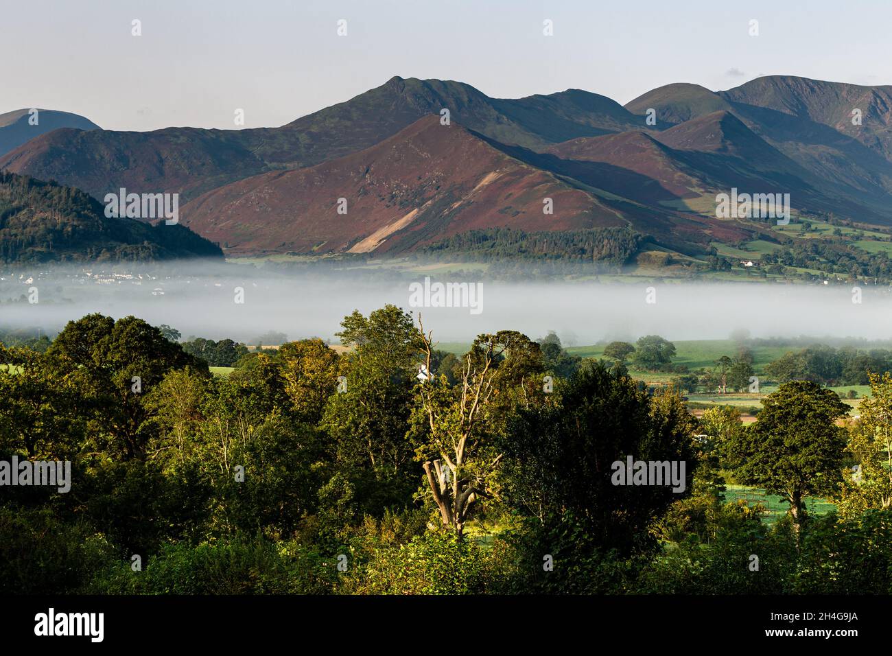 Early morning Fog over Keswick, taken from Applethwaite and Millbeck, Lake District, Cumbria, England UK. Stock Photo
