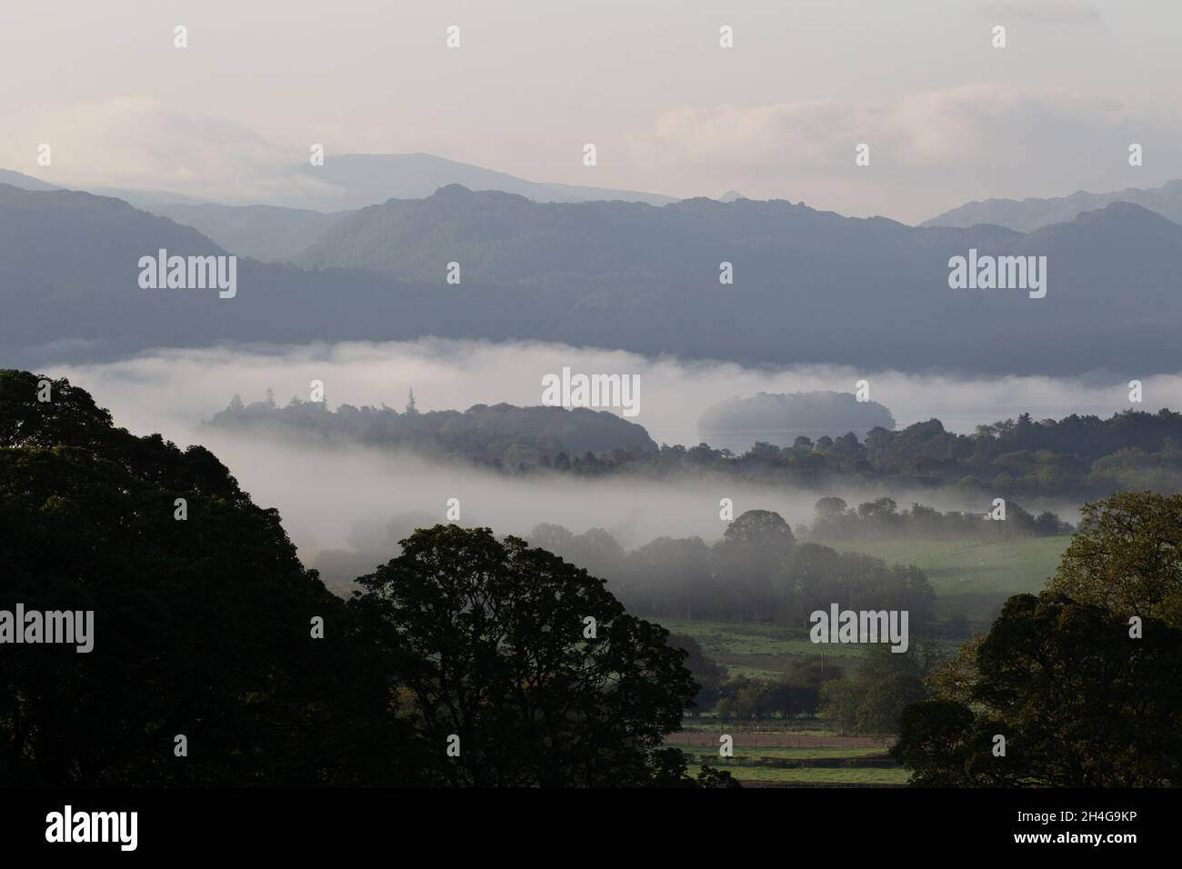 Early morning Fog over Keswick, taken from Applethwaite and Millbeck, Lake District, Cumbria, England UK. Stock Photo
