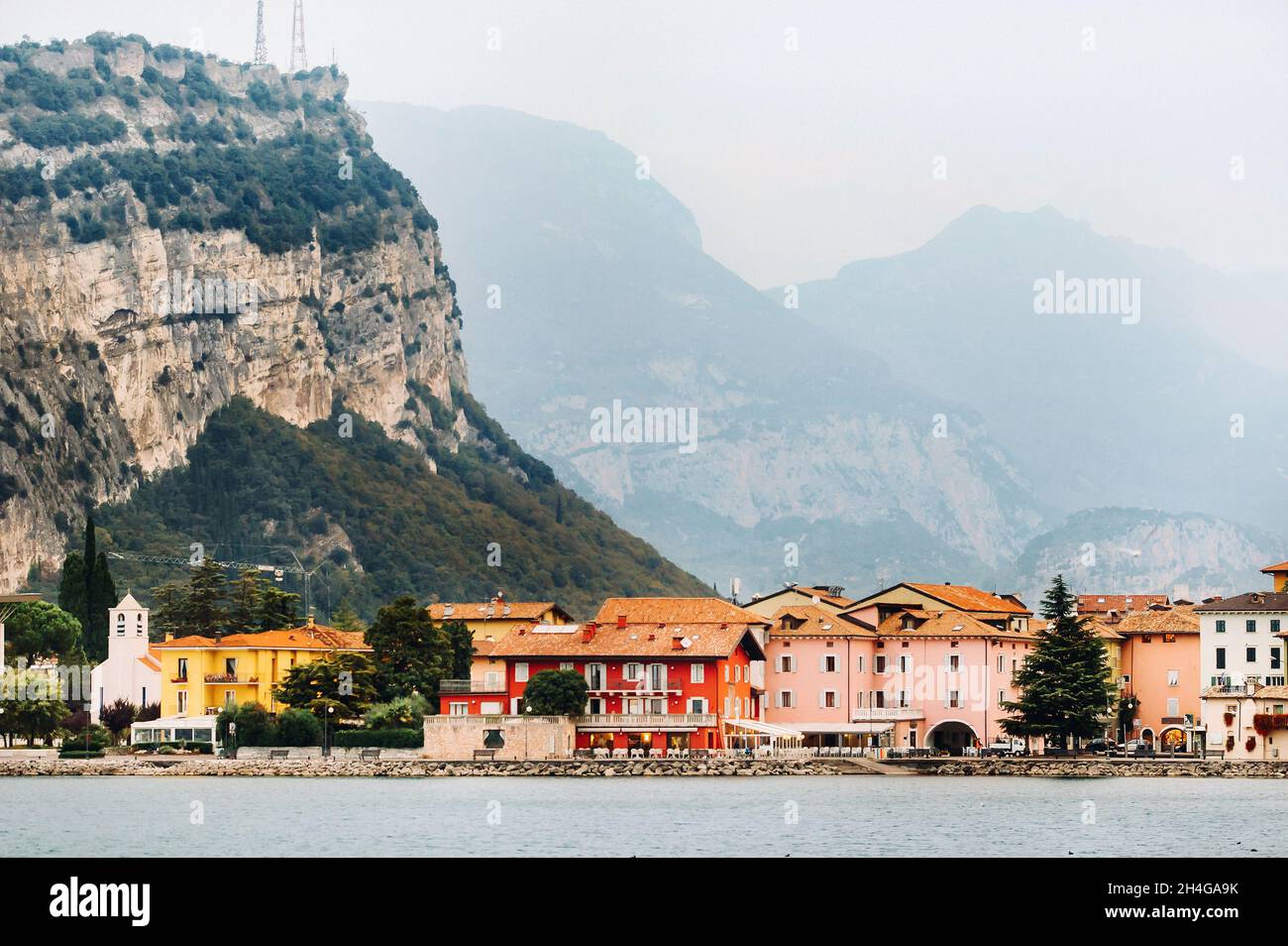 View of the harbour and the town of Torbole near lake Garda in Italy.Italian town of Torbole on lake Garda. Stock Photo