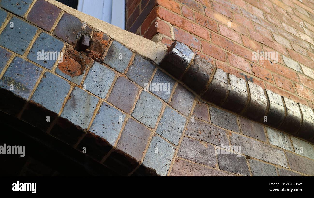 Rustic brick wall detail at heritage listed Winchcombe Carson Limited building at Teneriffe, Brisbane, Australia Stock Photo