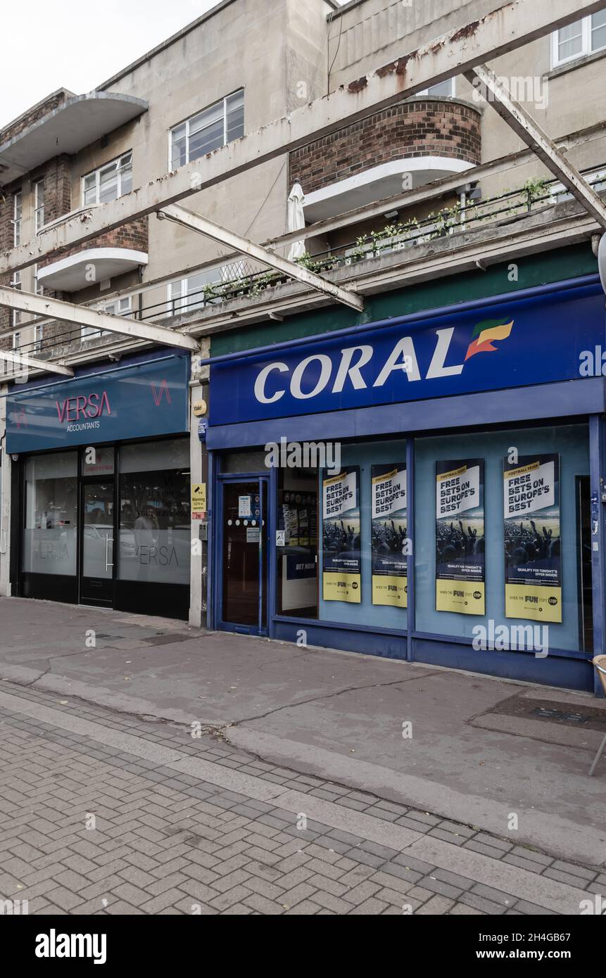 High street shops with apartments above, along Corbets Tey Road in