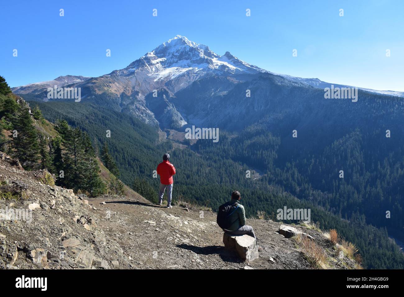 Two hikers enjoy spectacular views of Mt Hood from Bald Mountain on an October day on the McNeil Point Trail in the Mt Hood Wilderness Oregon USA Stock Photo Alamy