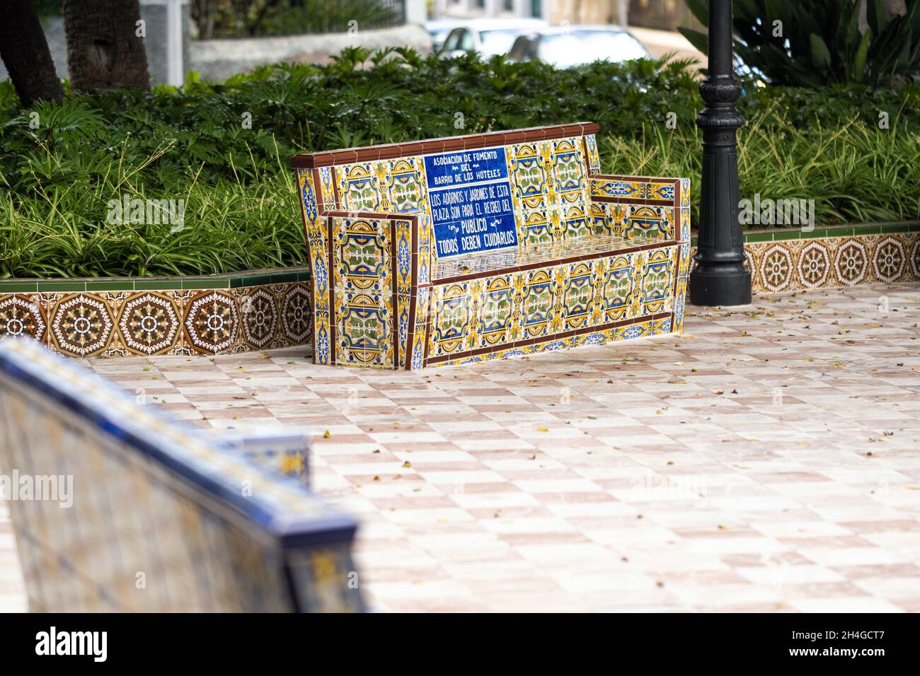 July 30, 2019: Tenerife, Canary Islands, Spain. Colorful tile bench in Los Patos Square in Santa Cruz de Tenerife. Stock Photo