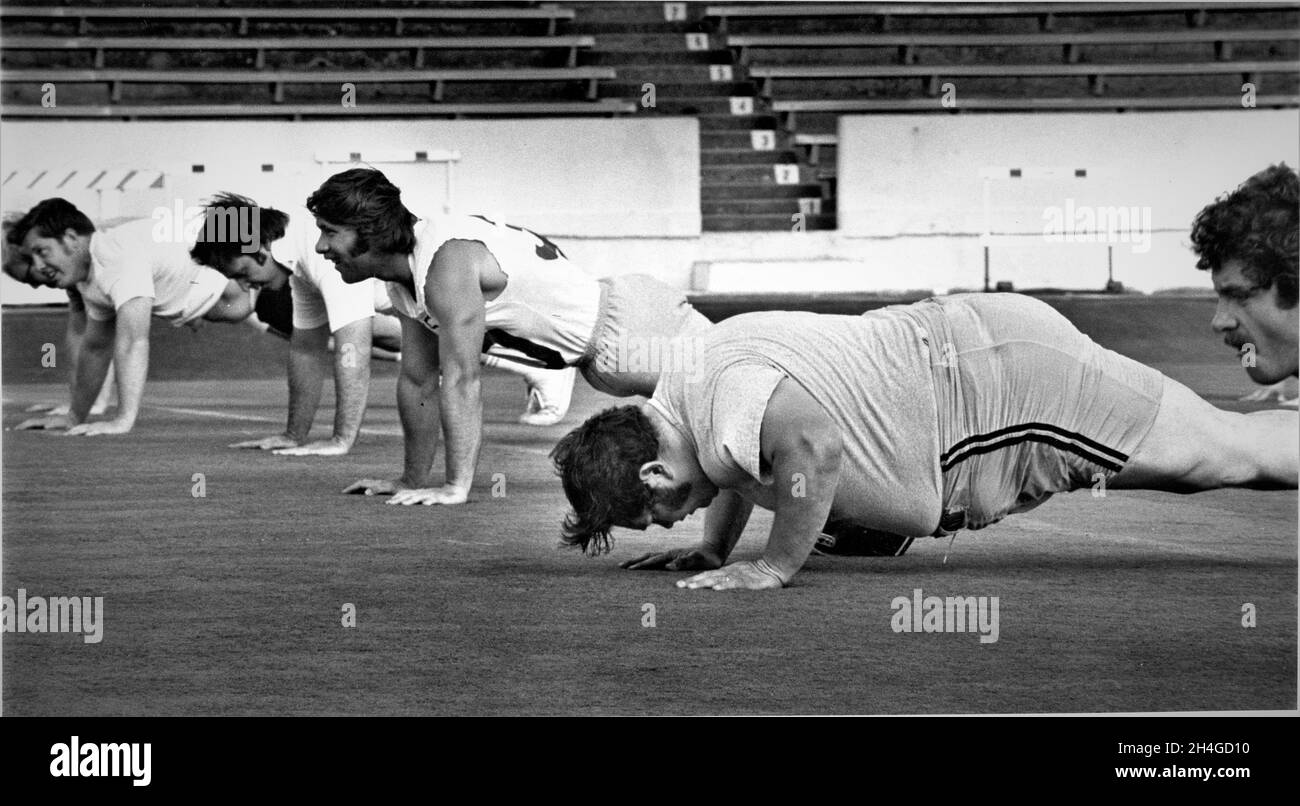 Workout for older guys who are over weight o play in alumni vs current players on high school football game Stock Photo