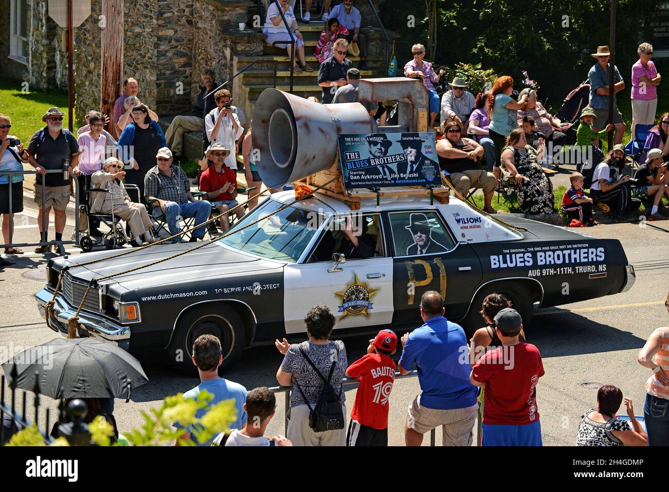 Dartmouth, Canada - June 30, 2005: The iconic Blues Brothers car is part of the annual Natal Day Parade in the Halifax Regional Municipality. They are Stock Photo