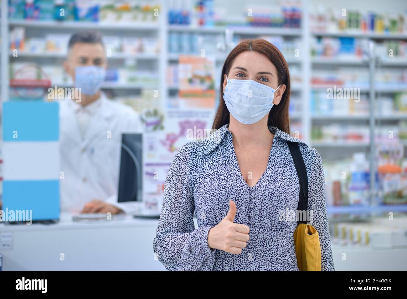 Long haired woman medical mask hi-res stock photography and images - Alamy
