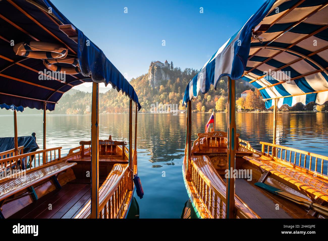 Traditional wooden boats on lake Bled, Slovenia Stock Photo Alamy