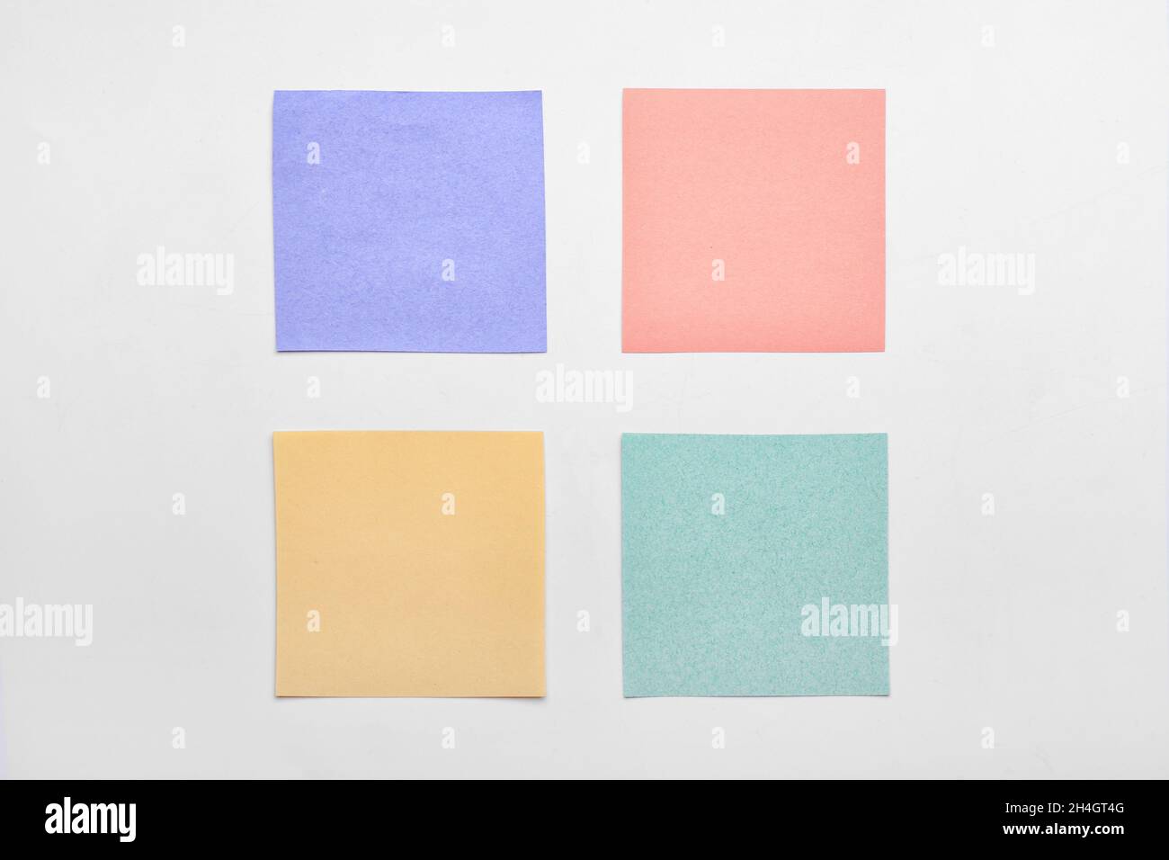Colorful sticky notes on white background Stock Photo - Alamy