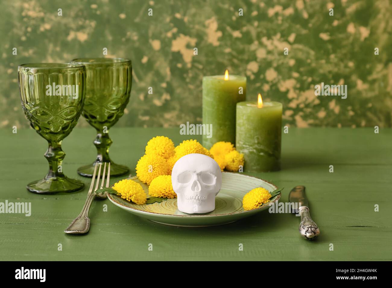Table setting with human skull for Mexico's Day of the Dead (El Dia de ...