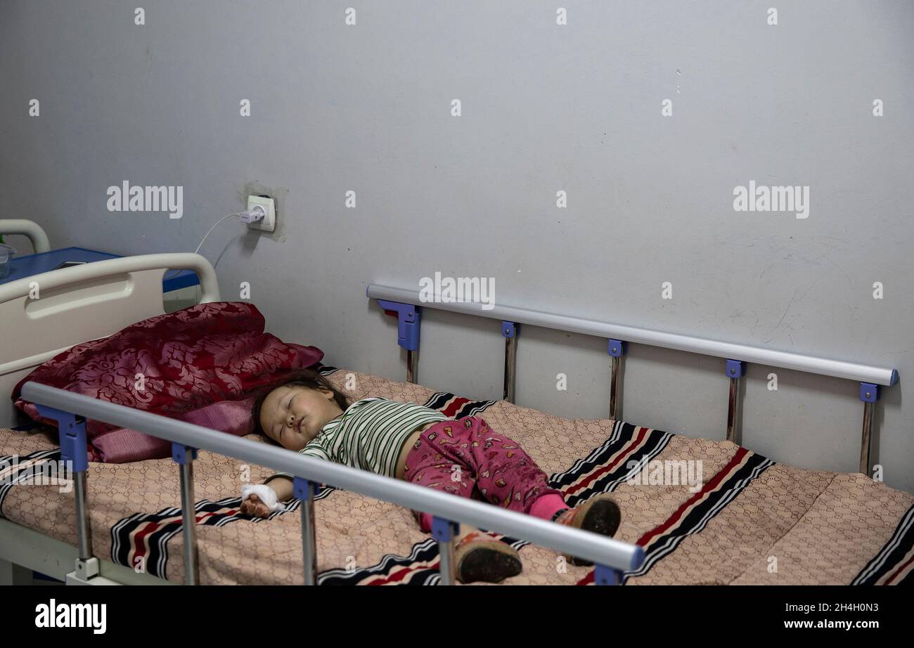 A baby suffering from respiratory complications lies in a paediatric emergency unit in one of the  city hospitals in the capital Ulaanbaatar, January Stock Photo