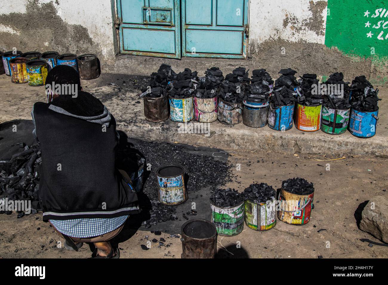 A Shopkeeper Puts Charcoal In The Tins For Sale In Nakuru Trees Capture Carbon Dioxide From The Atmosphere And Convert It Into Biomass Through The Process Of Photosynthesis Uncontrolled Felling Of Trees To