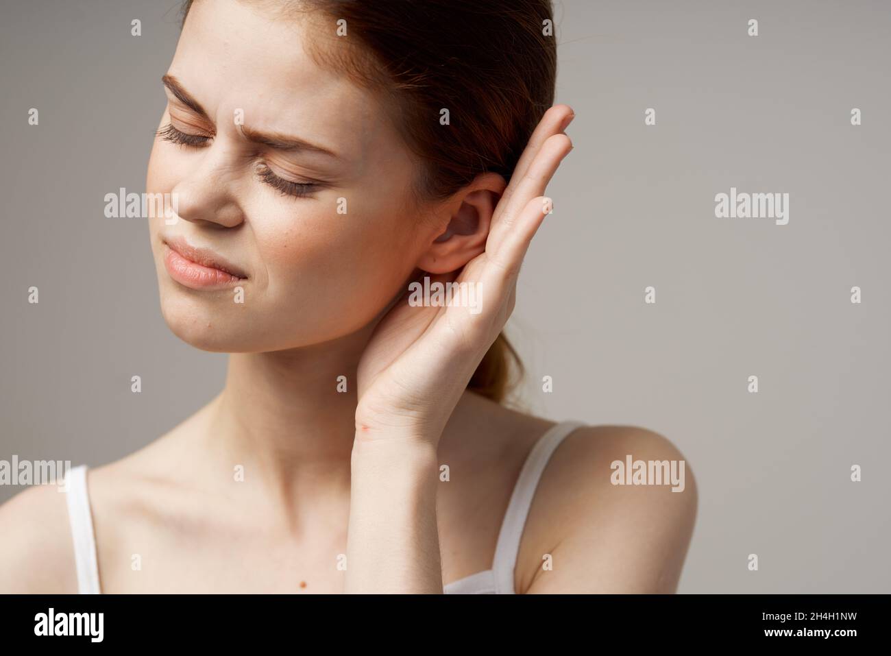 sick woman ear pain otitis media health problems infection studio