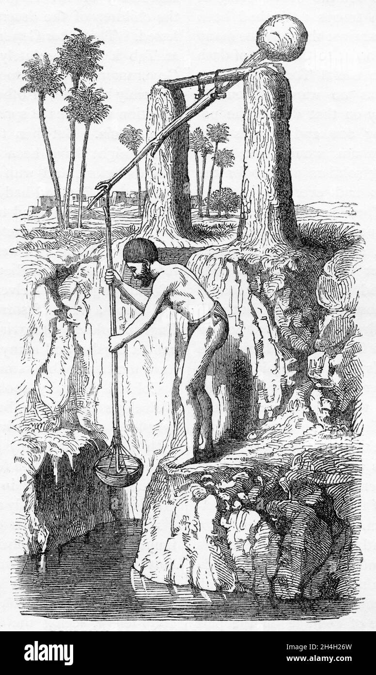 Engraving of an Egyptian peasant using a shadoof to draw water for irrigation, from a publication circa 1900 Stock Photo