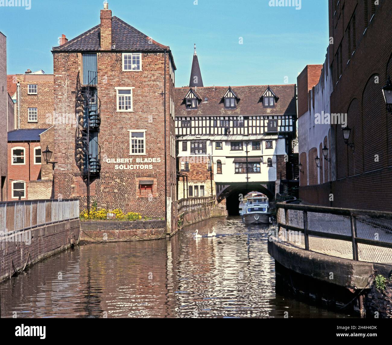 Hight street shops passing over the River Witham, Lincoln, UK. Stock Photo