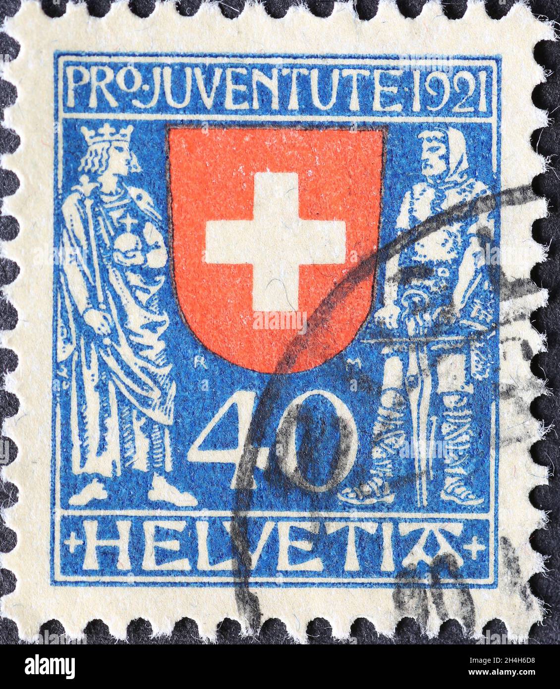 Switzerland - Circa 1921: a postage stamp printed in the Switzerland showing the historical coat of arms of Switzerland with the emperor and Wilhelm T Stock Photo