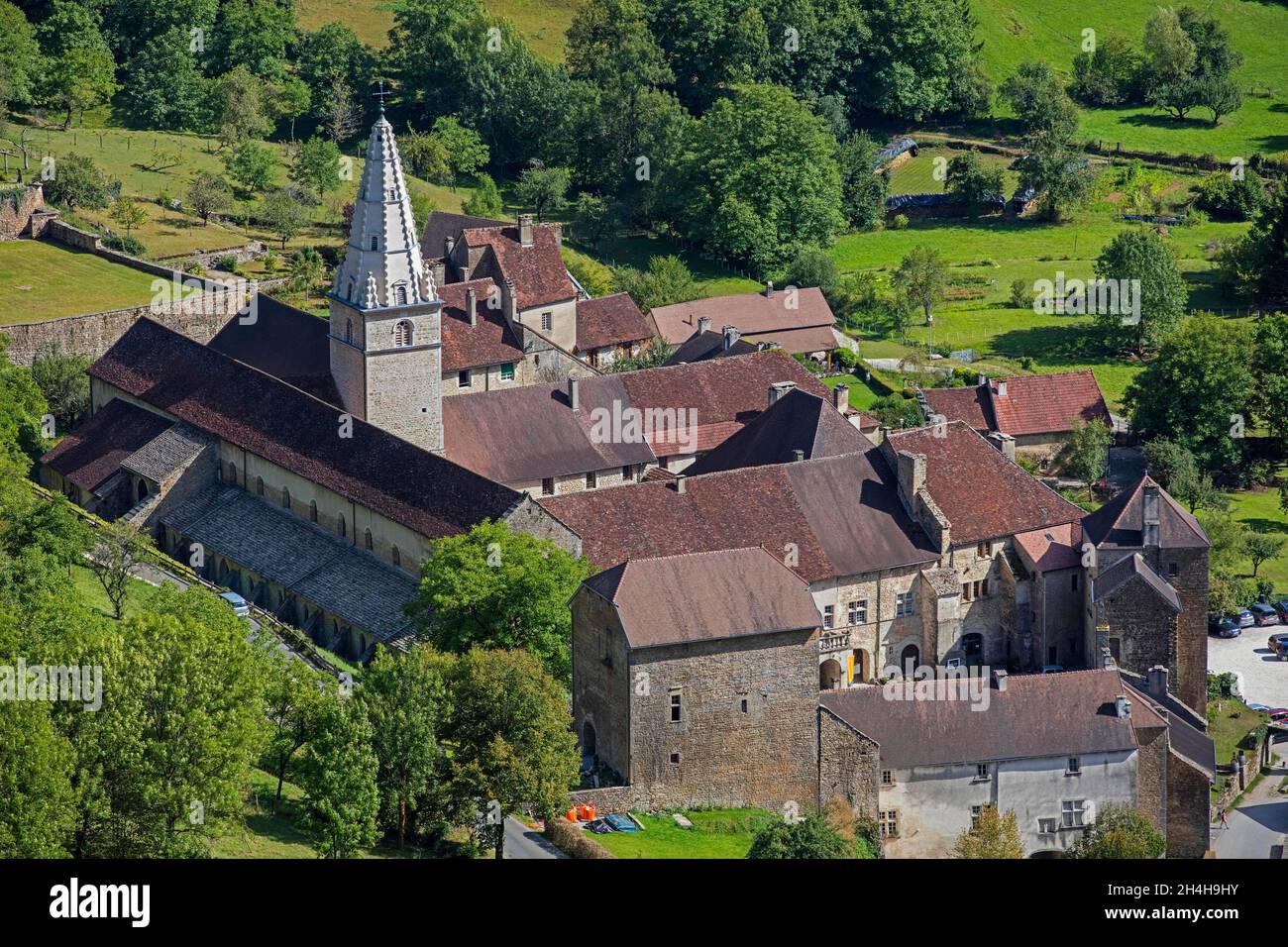 Aerial view over Baume Abbey, Abbaye Saint-Pierre de Baume-les-Messieurs, Jura department in Franche-Comte, Lons-le-Saunier, France Stock Photo