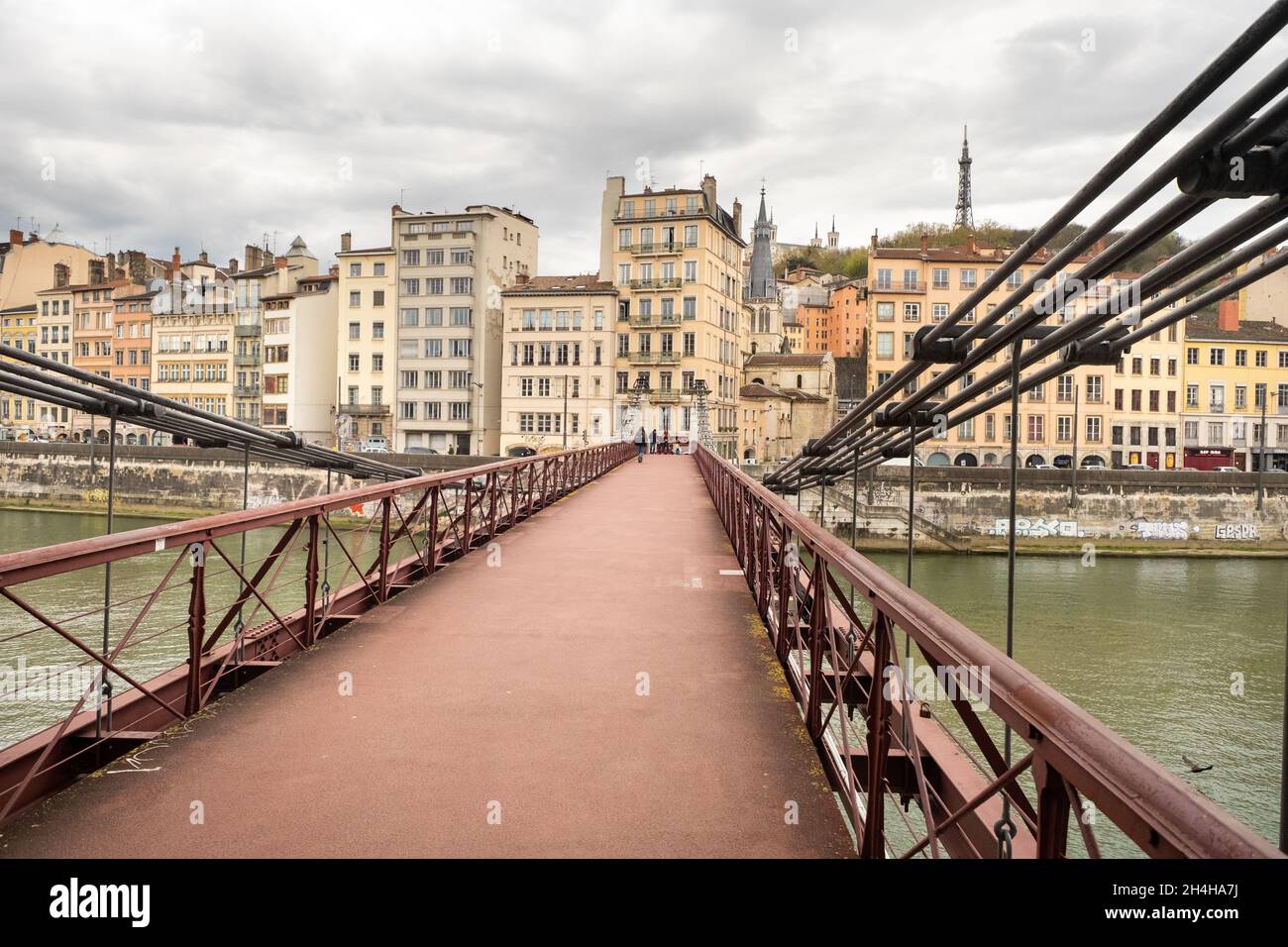 LYON, FRANCE-APRIL 7, 2019: the Passerelle Paul Couturier Bridge in the Saone River. Stock Photo