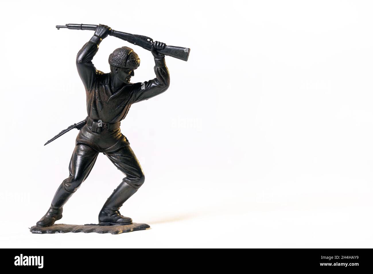 Vintage toy black soldier isolated on white background Stock Photo - Alamy