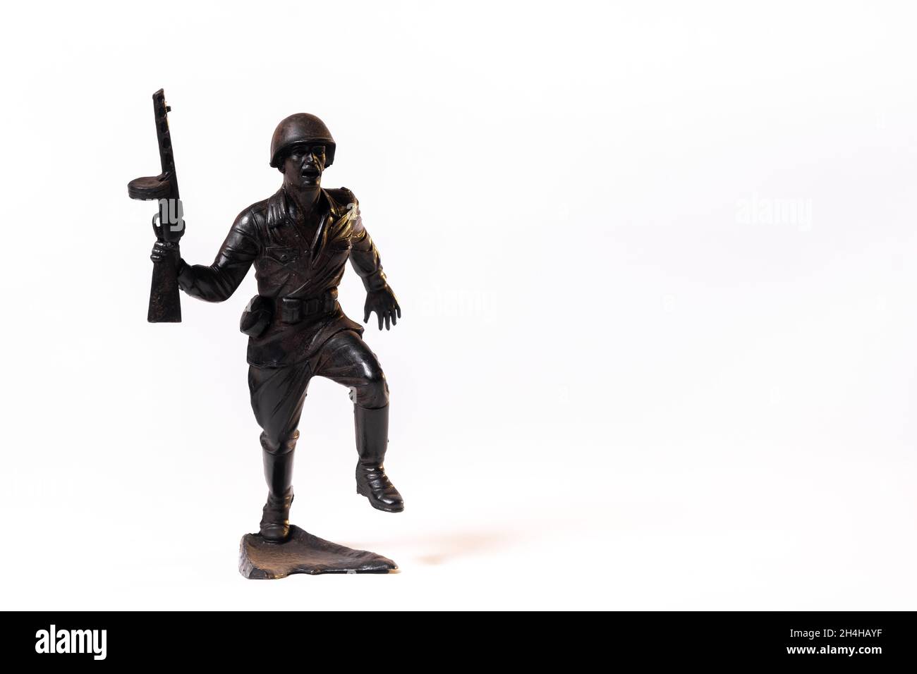 Vintage toy black soldier isolated on white background Stock Photo - Alamy