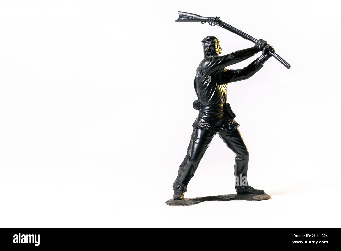 Vintage toy black soldier isolated on white background Stock Photo - Alamy