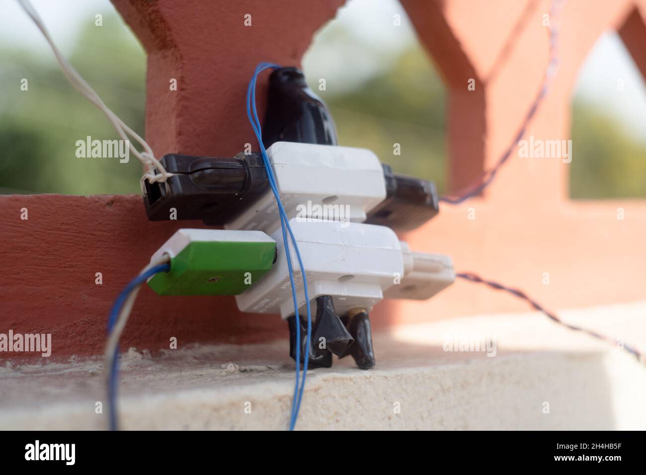 harzardous electrical plug connections with multiple outlets which overloads and causes a safety