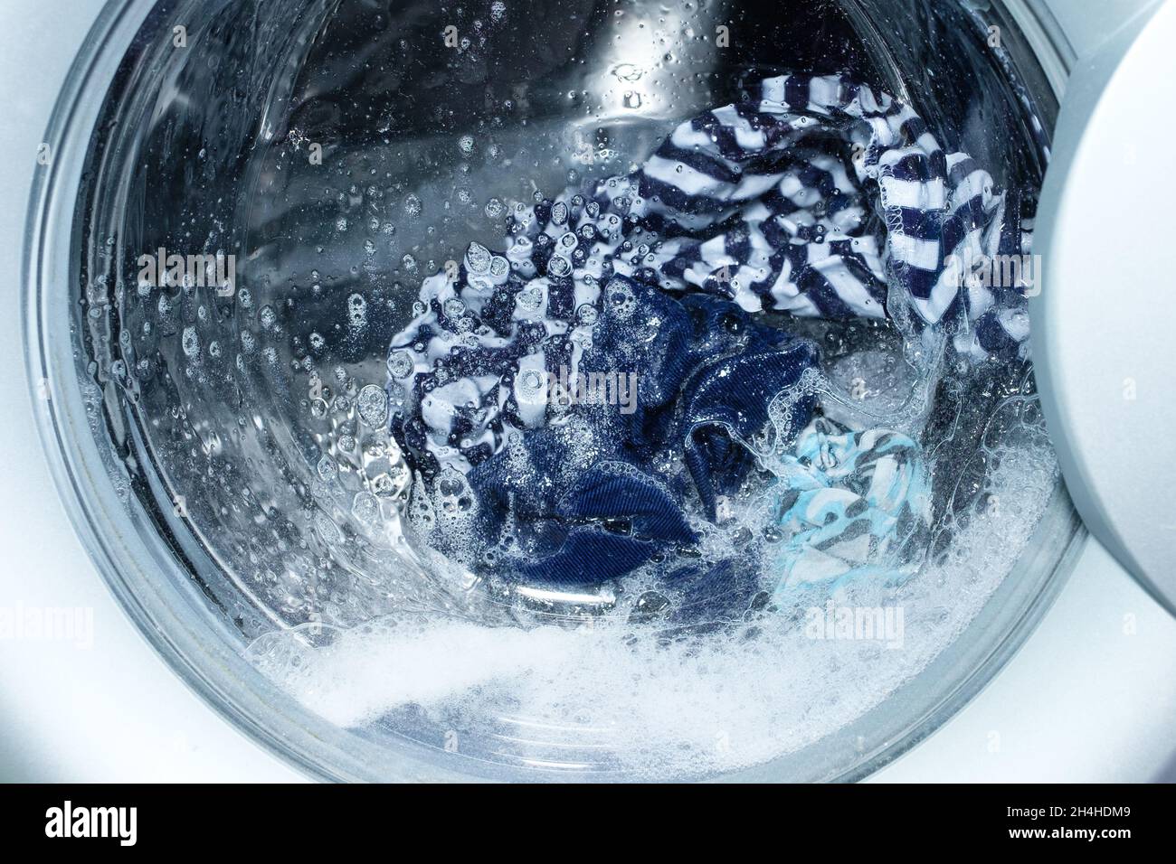 Linen washing in the washing machine Stock Photo Alamy