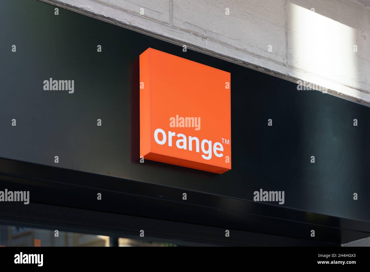 VALENCIA, SPAIN - OCTOBER 26, 2021: Orange is a French multinational telecommunications corporation Stock Photo