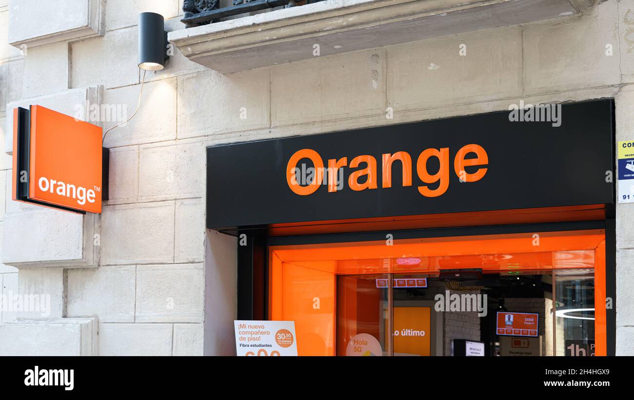 VALENCIA, SPAIN - OCTOBER 26, 2021: Orange is a French multinational telecommunications corporation Stock Photo