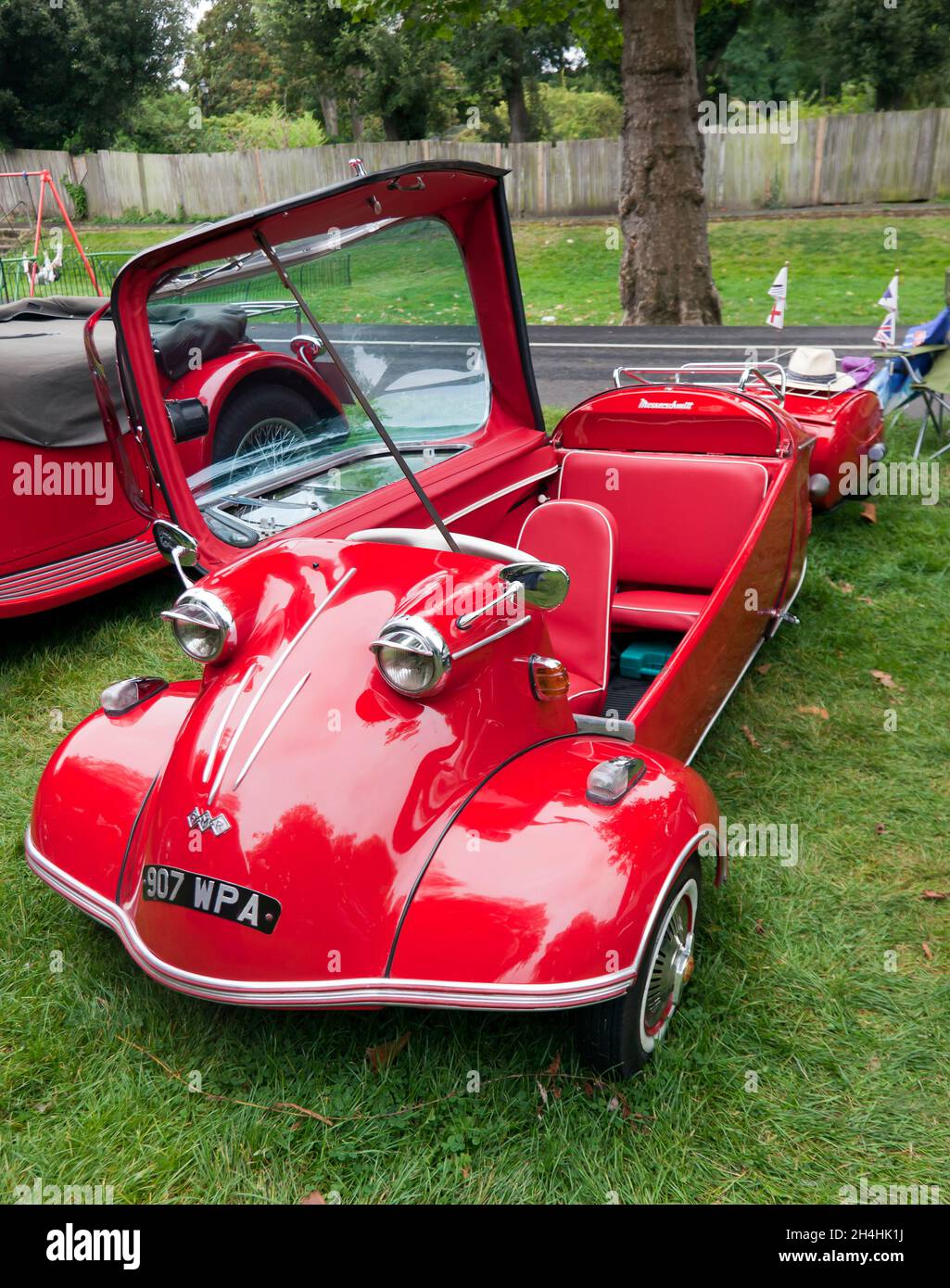 View of a Red, 1961,  Messerschmitt KR200,   with matching trailer,  on display at the Sandwich Festival Classic Car Show 2021 Stock Photo