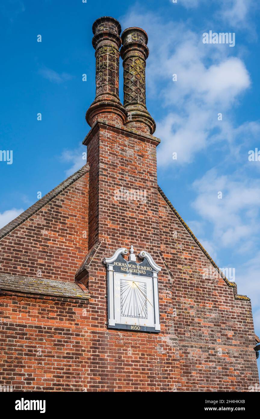 These Sun dials are part of Moot Hall located on the promenade of the Suffolk Heritage Coast and historical seaside resort town of Aldeburgh, Stock Photo