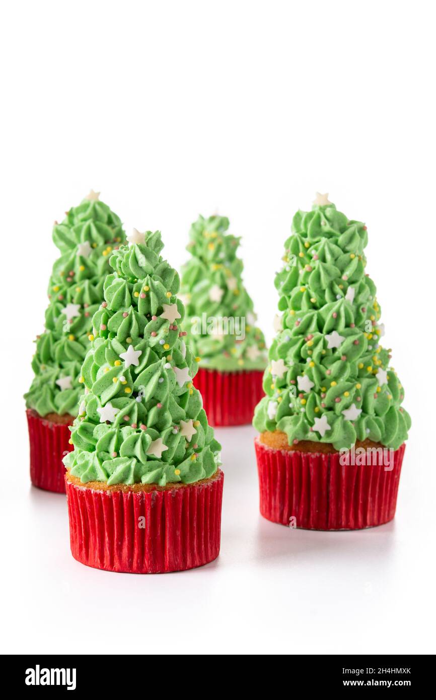 Christmas tree cupcakes isolated on white background Stock Photo