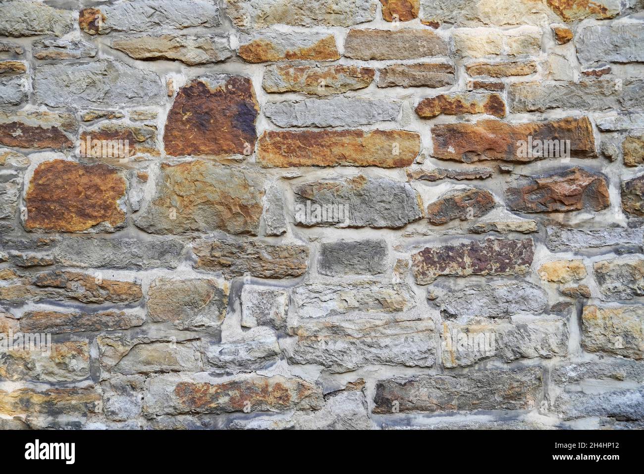 Old stone wall as a background Stock Photo - Alamy