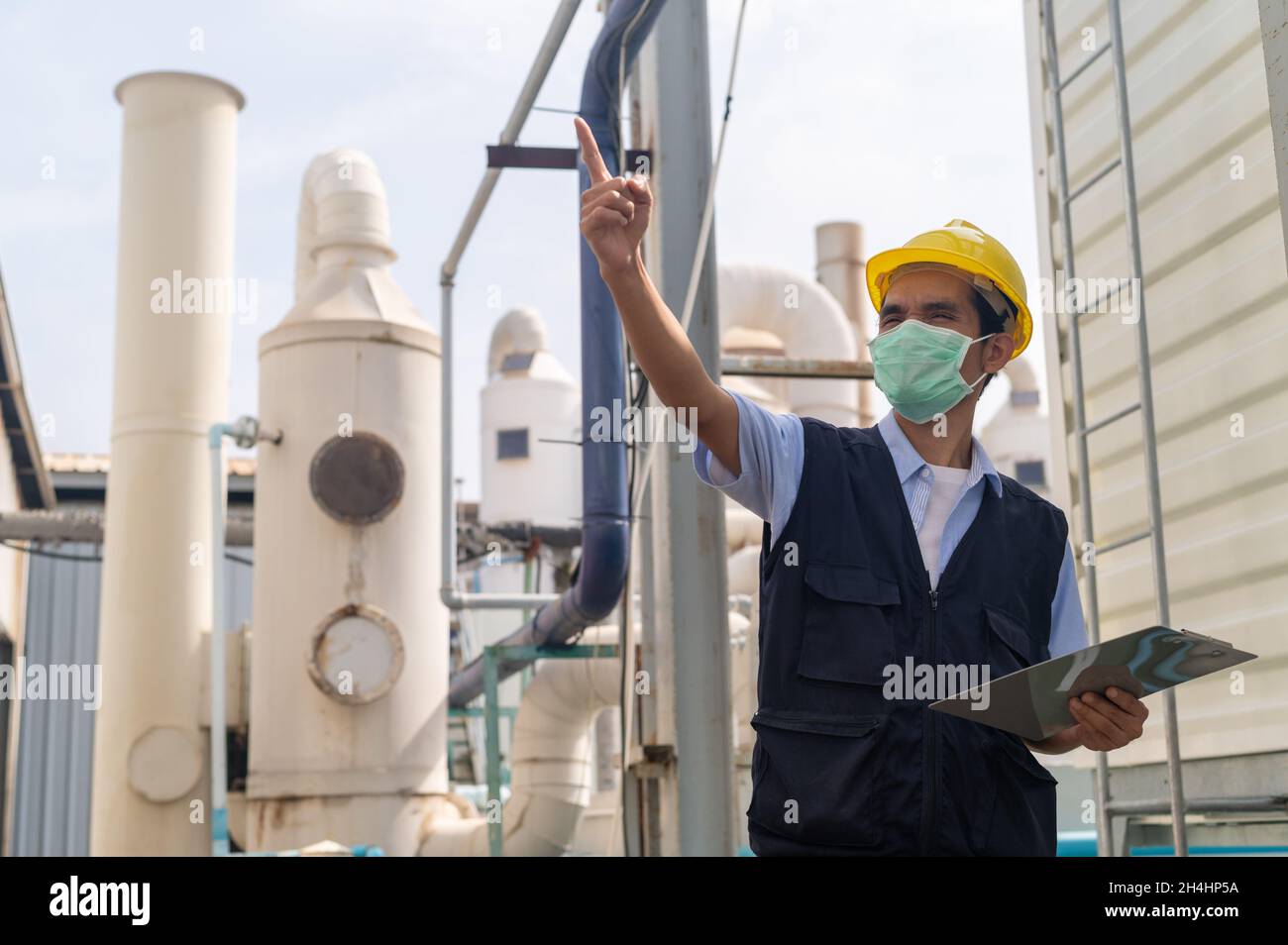 Engineer checking power plant system in factory Stock Photo Alamy
