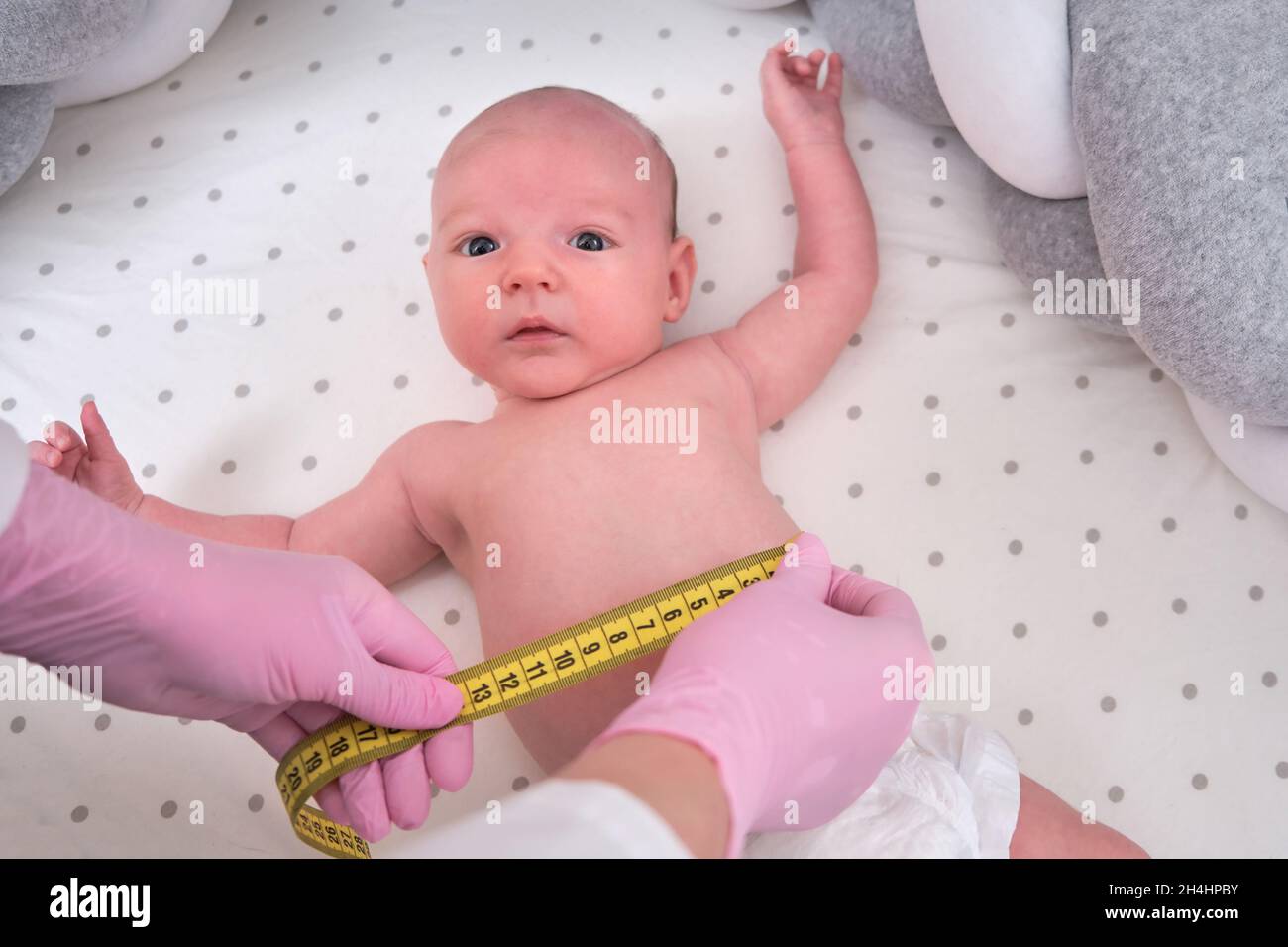 Nurse measuring baby height hires stock photography and images Alamy