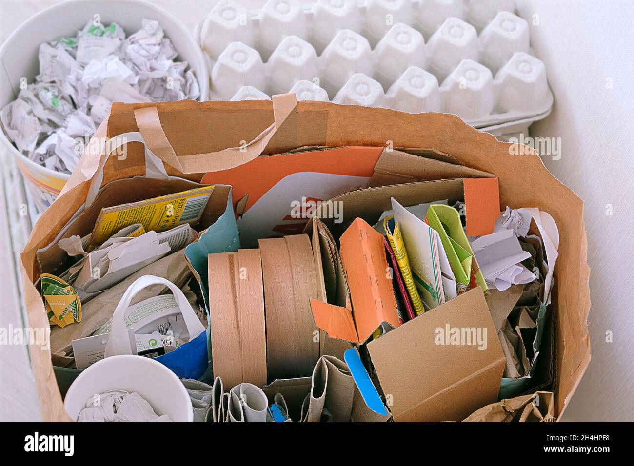 Paper and cardboard prepared for recycling. Bundles of cardboard to be