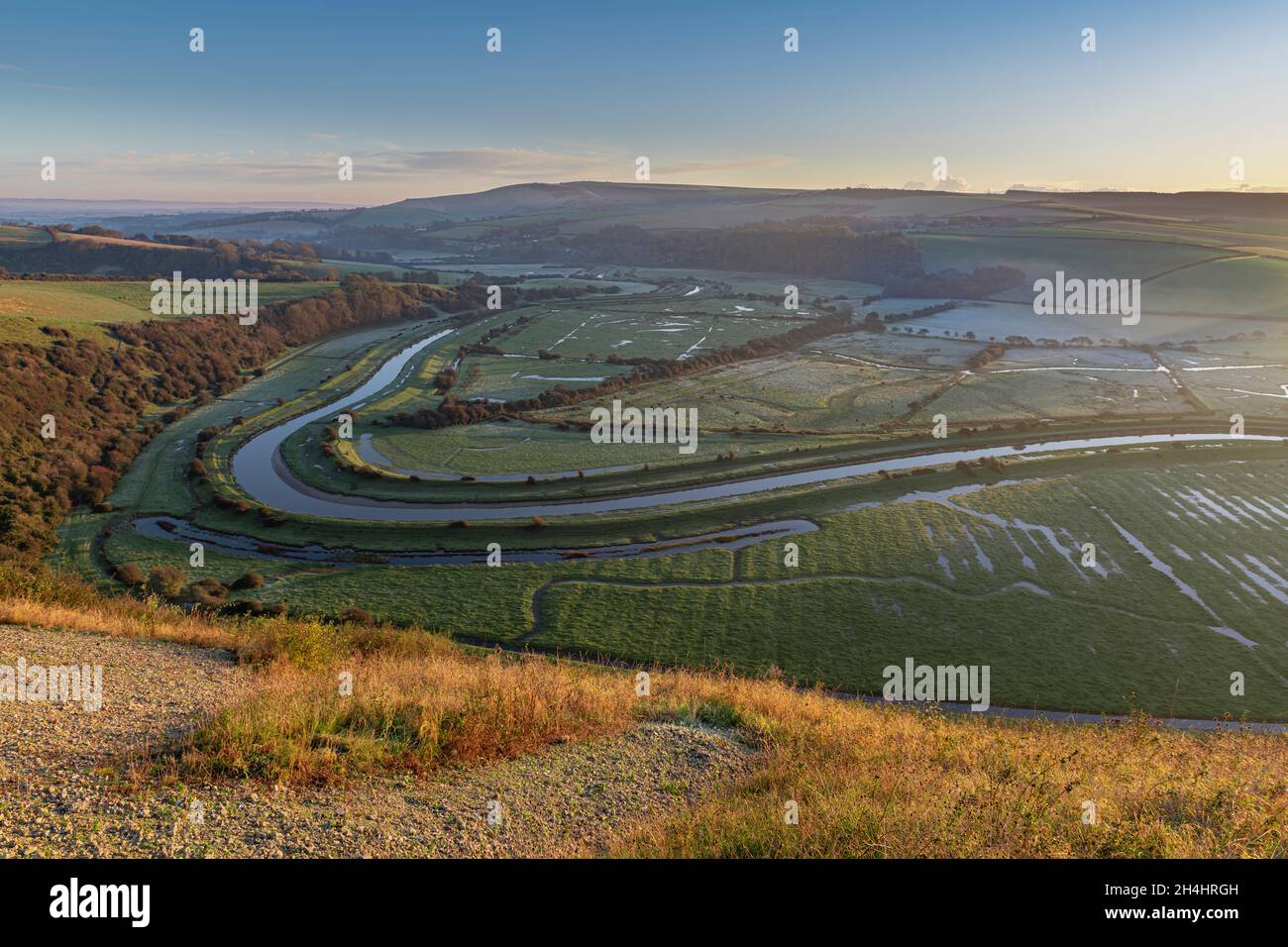 View of a meandering river in a valley in autumn - November Stock Photo