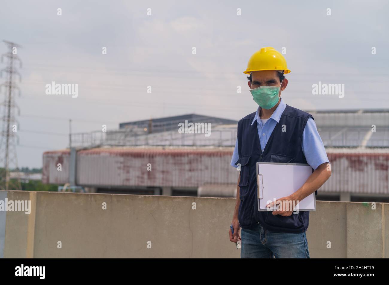 Engineers monitor and control work in the construction area Stock Photo