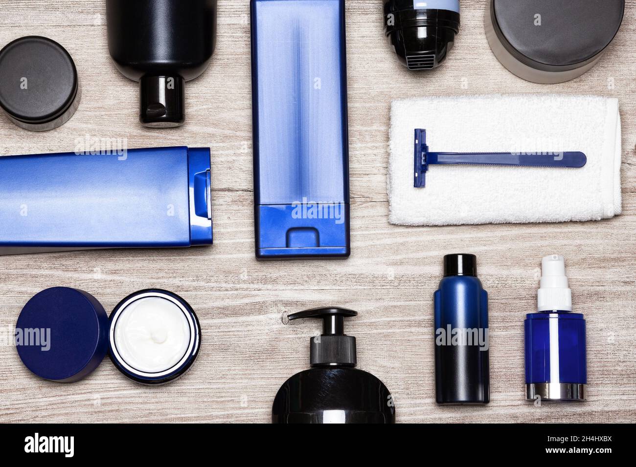 Men cosmetics must-haves. Essential male grooming products flat lay Stock Photo