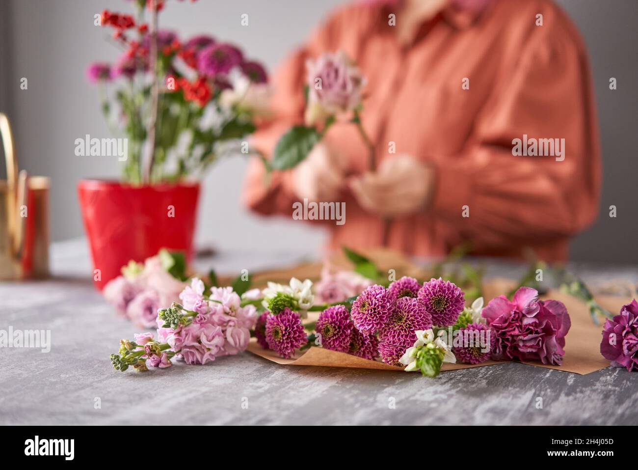 Step by step installation of flowers in a vase. Flowers bunch, set for home. Fresh cut flowers for decoration home. European floral shop. Delivery Stock Photo