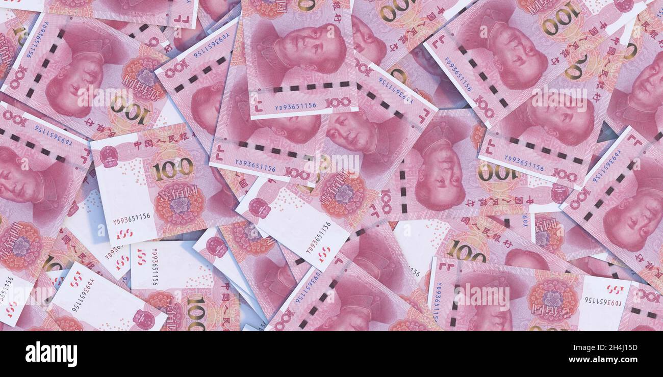 Chinese paper currency, Yuan renminbi bill banknotes background. China economy, banking, financial business growth in Asia concept Stock Photo