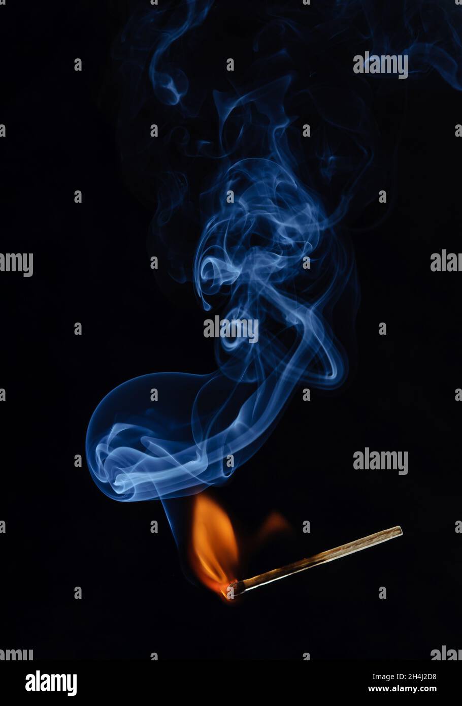Match burning and smoking Stock Photo Alamy