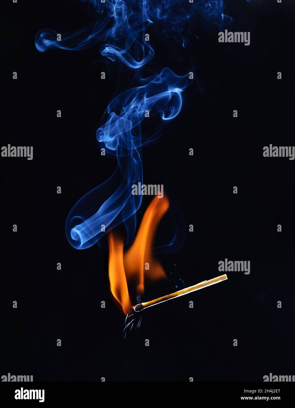 Match burning and smoking Stock Photo Alamy